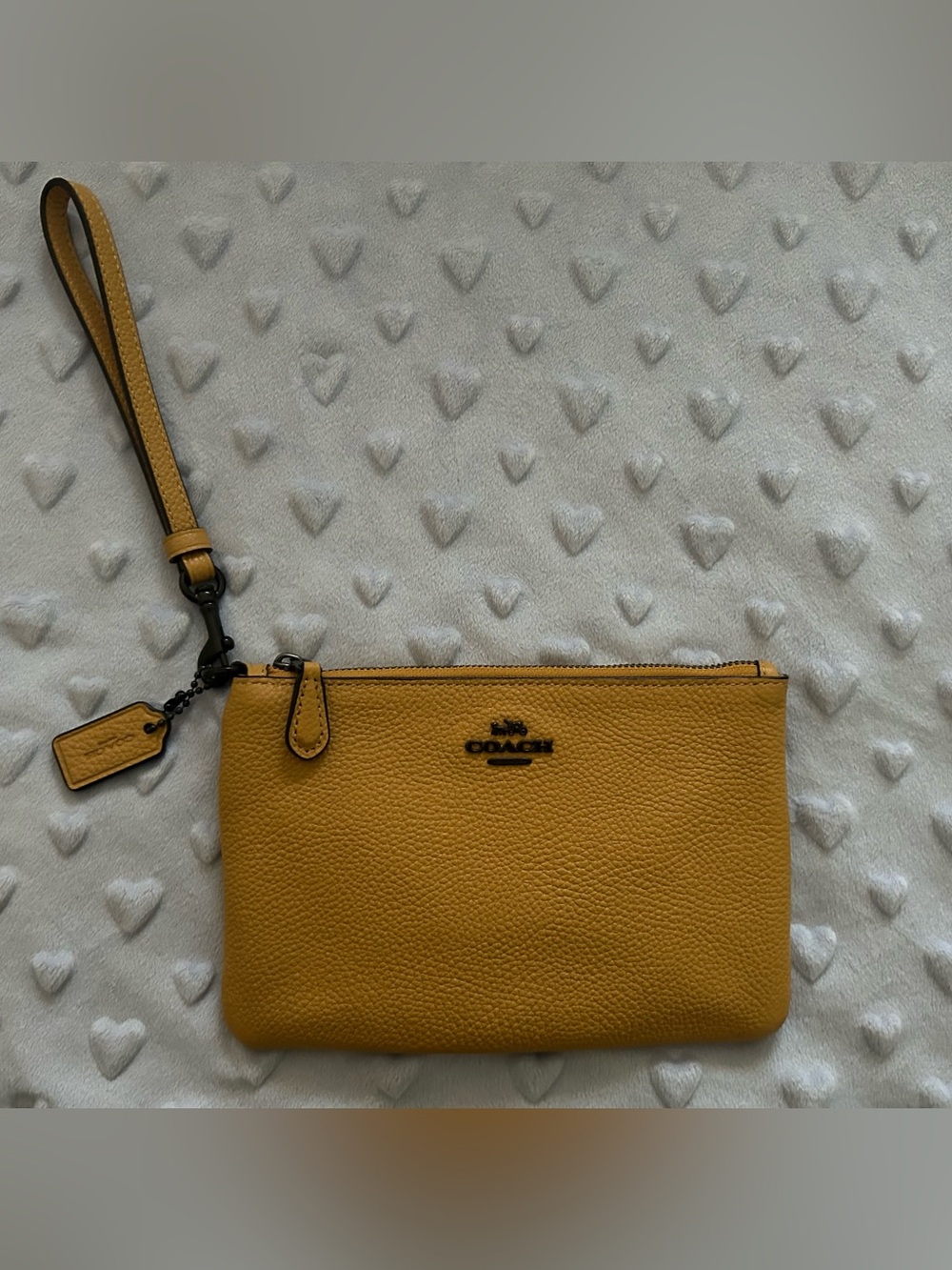 Coach Pebbled Leather Wristlet in Mustard